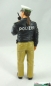 Preview: 500046 policewoman with radio - green uniform